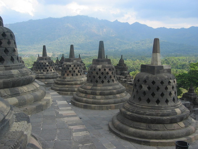 Borobudur Temple with mountains in background